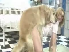 A gorgeous golden-haired cougar lowers her suit and endures a vicious dog attack.